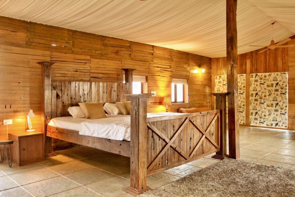 wooden villa antiques poolside infinity pool hill view