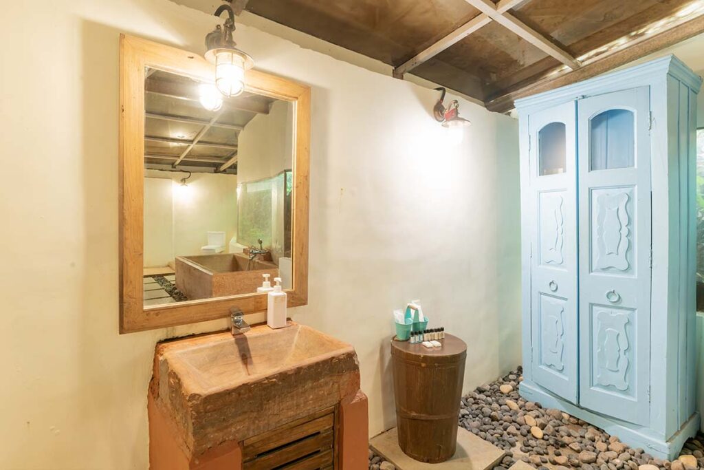 wooden villa antiques poolside infinity pool hill view