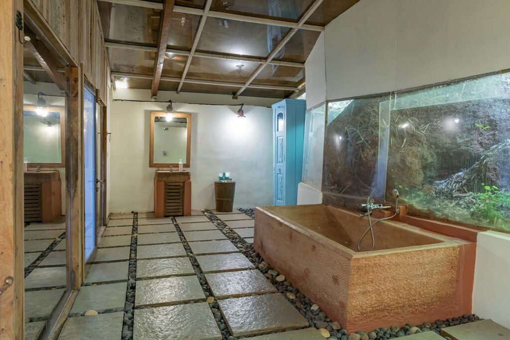 wooden villa antiques poolside infinity pool hill view