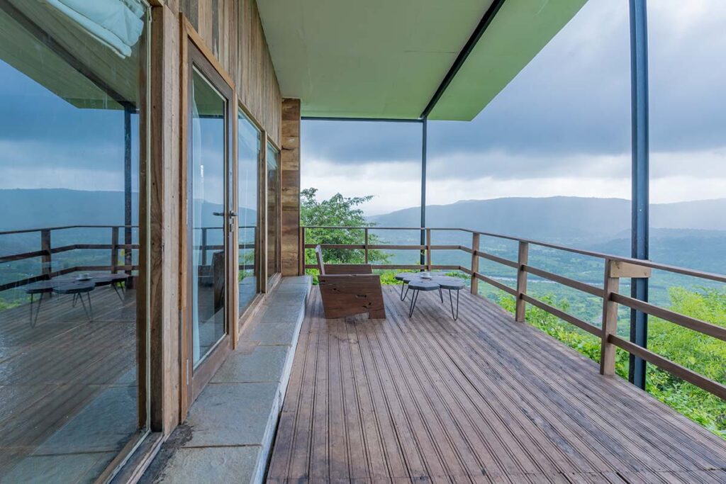 wooden villa antiques poolside infinity pool hill view